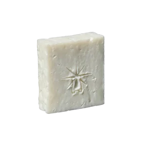 Black Altar Earth Salt Bar — pure off-white sea-salt soap with subtle texture, bearing the star-altar logo.