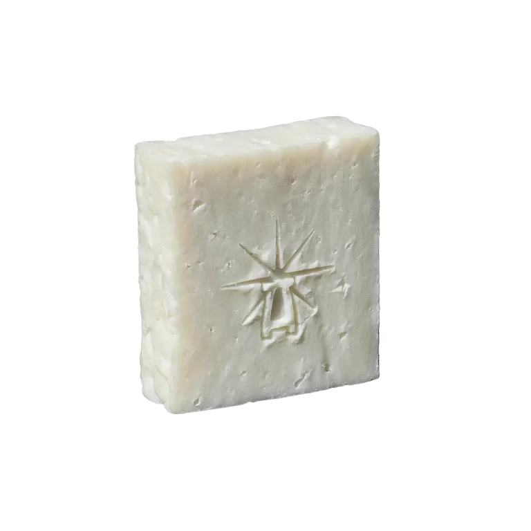 Black Altar Earth Salt Bar — pure off-white sea-salt soap with subtle texture, bearing the star-altar logo.