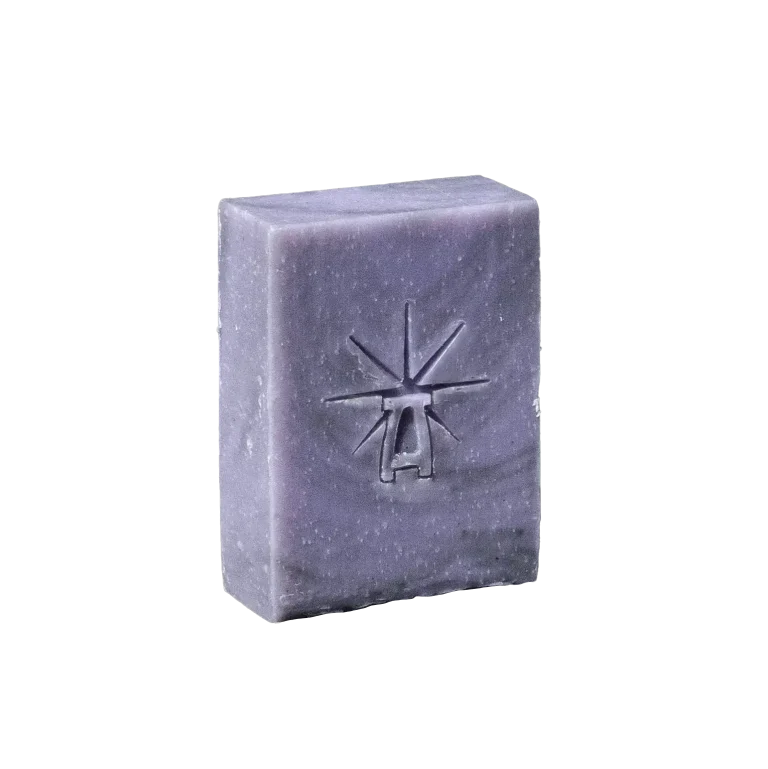 Black Altar Mystic Twilight Bar — muted lavender soap with fine speckles and the star-altar logo imprint. deep-cleanse bar