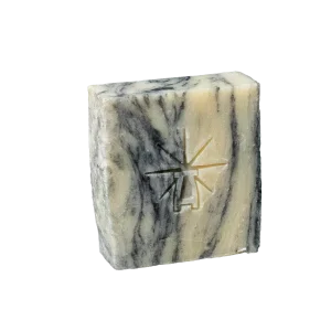 Black Altar Sacred Marble Bar — cream and charcoal swirled soap stamped with the star-altar logo. charcoal-clay-balance-cleansing-bar