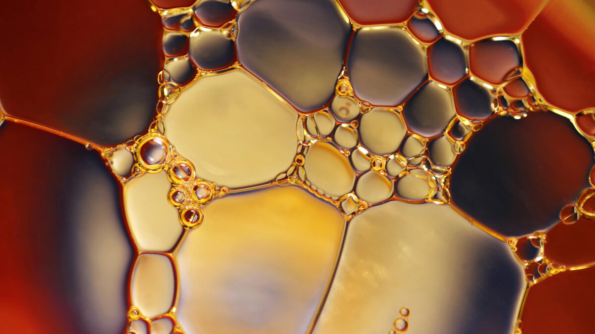 soap chemistry graphic image of soap bubbles under a microscope.