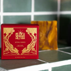 Black Altar Ritual Ember red boxed soap with warm amber bar on tile