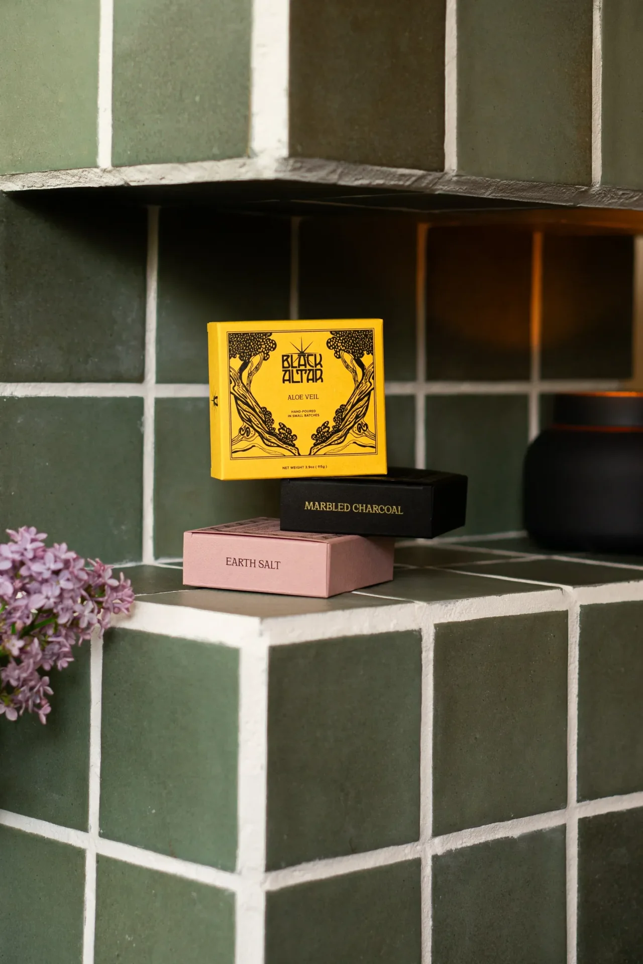 Black Altar yellow boxed soap featured above black and pink boxes
