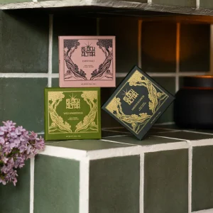 Angled Black Altar soap box trio in pink, green, and black gold