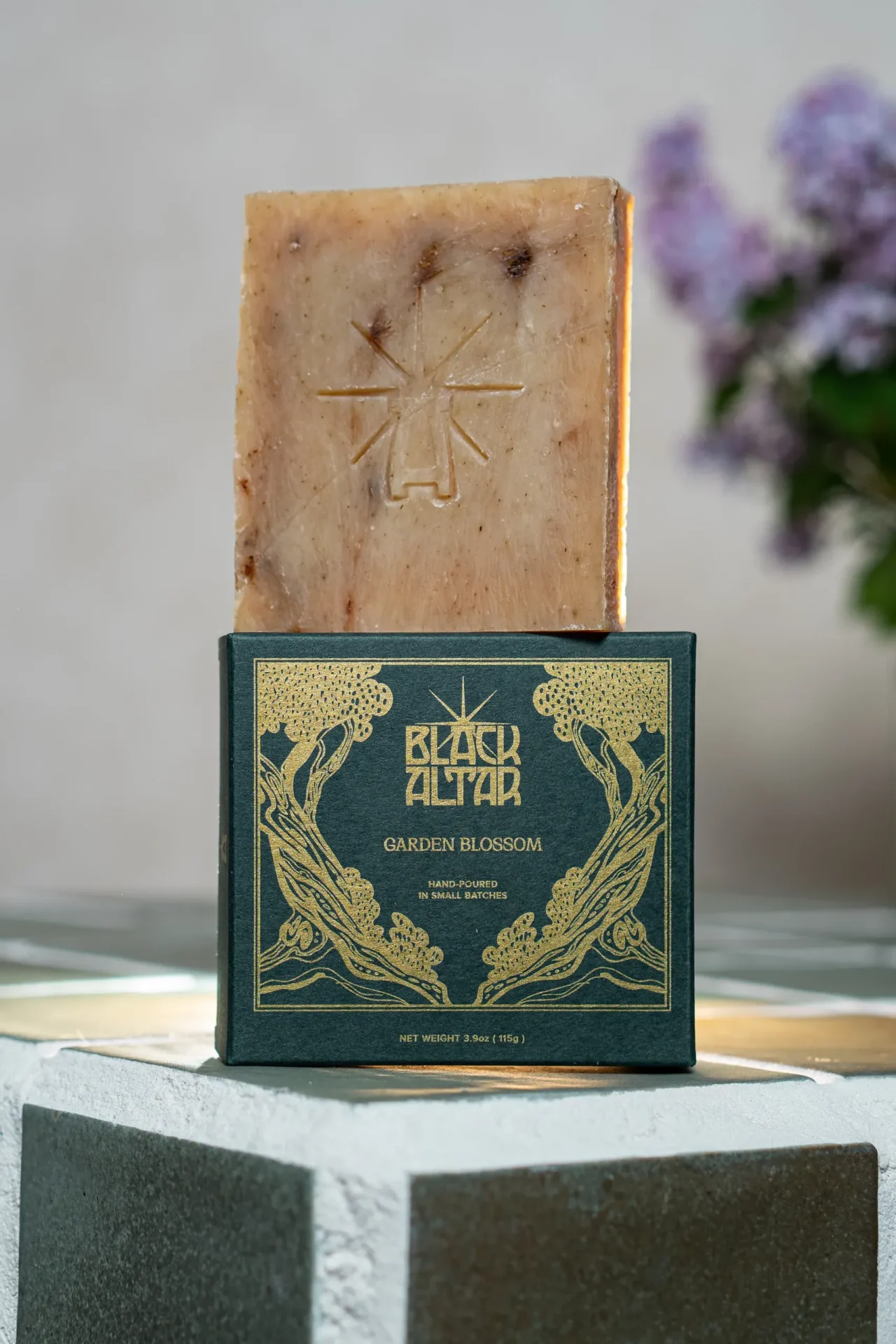 Black Altar green gold boxed soap with tan speckled bar behind