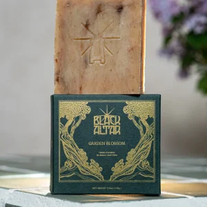 Black Altar green gold boxed soap with tan speckled bar behind
