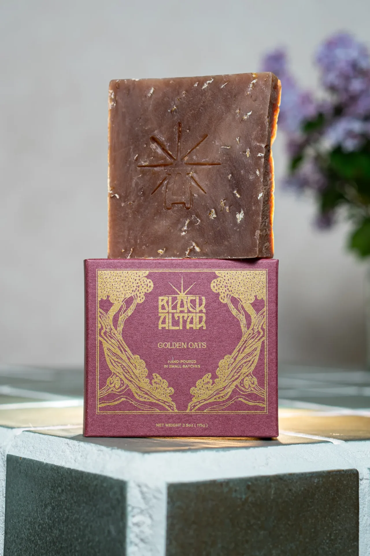 Black Altar mauve boxed soap with rustic brown speckled bar behind