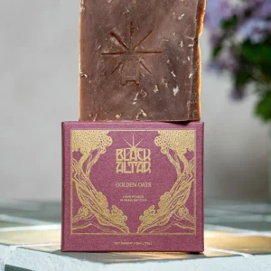 Black Altar mauve boxed soap with rustic brown speckled bar behind
