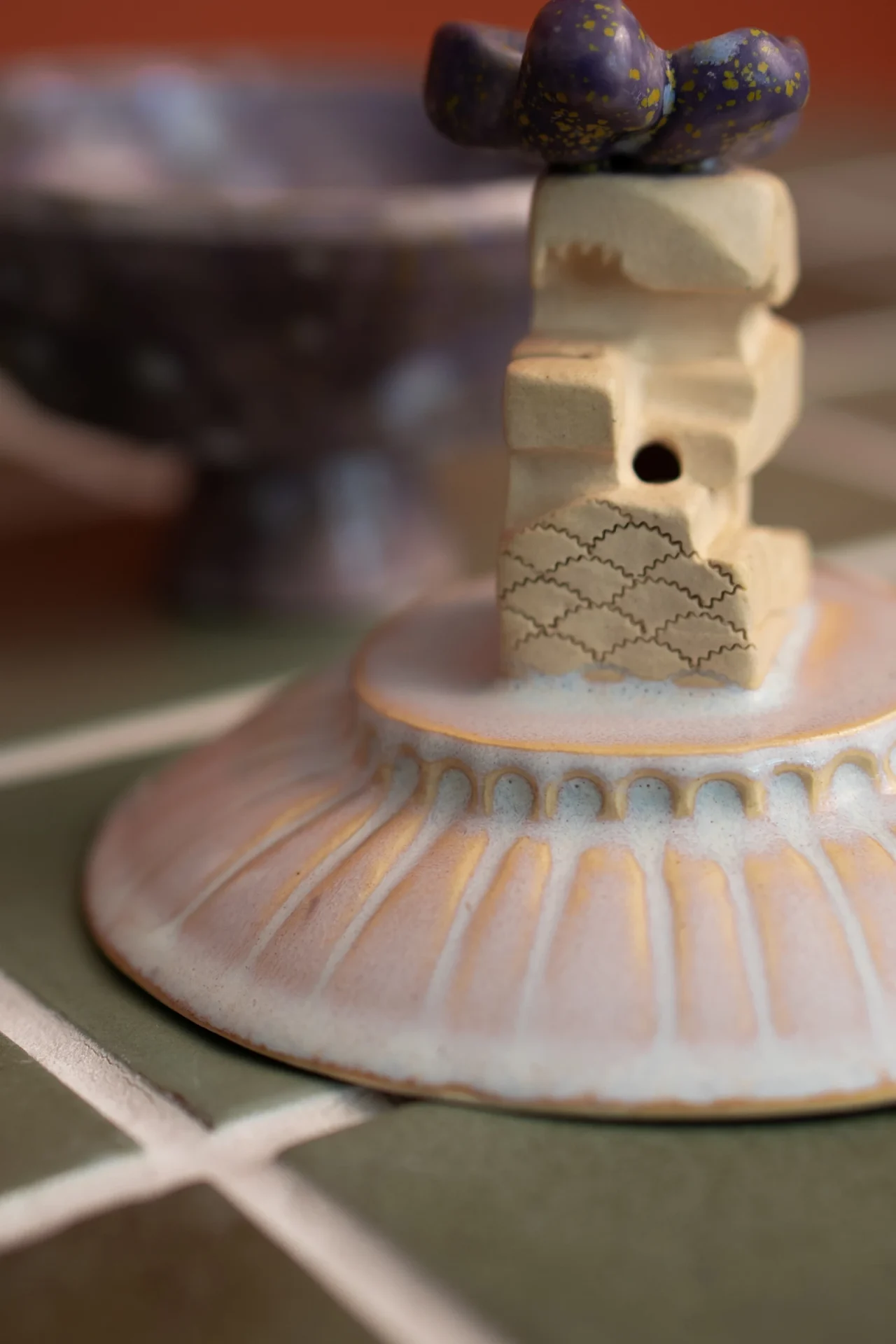 Fish-scale texture on the alien rider, carved by hand