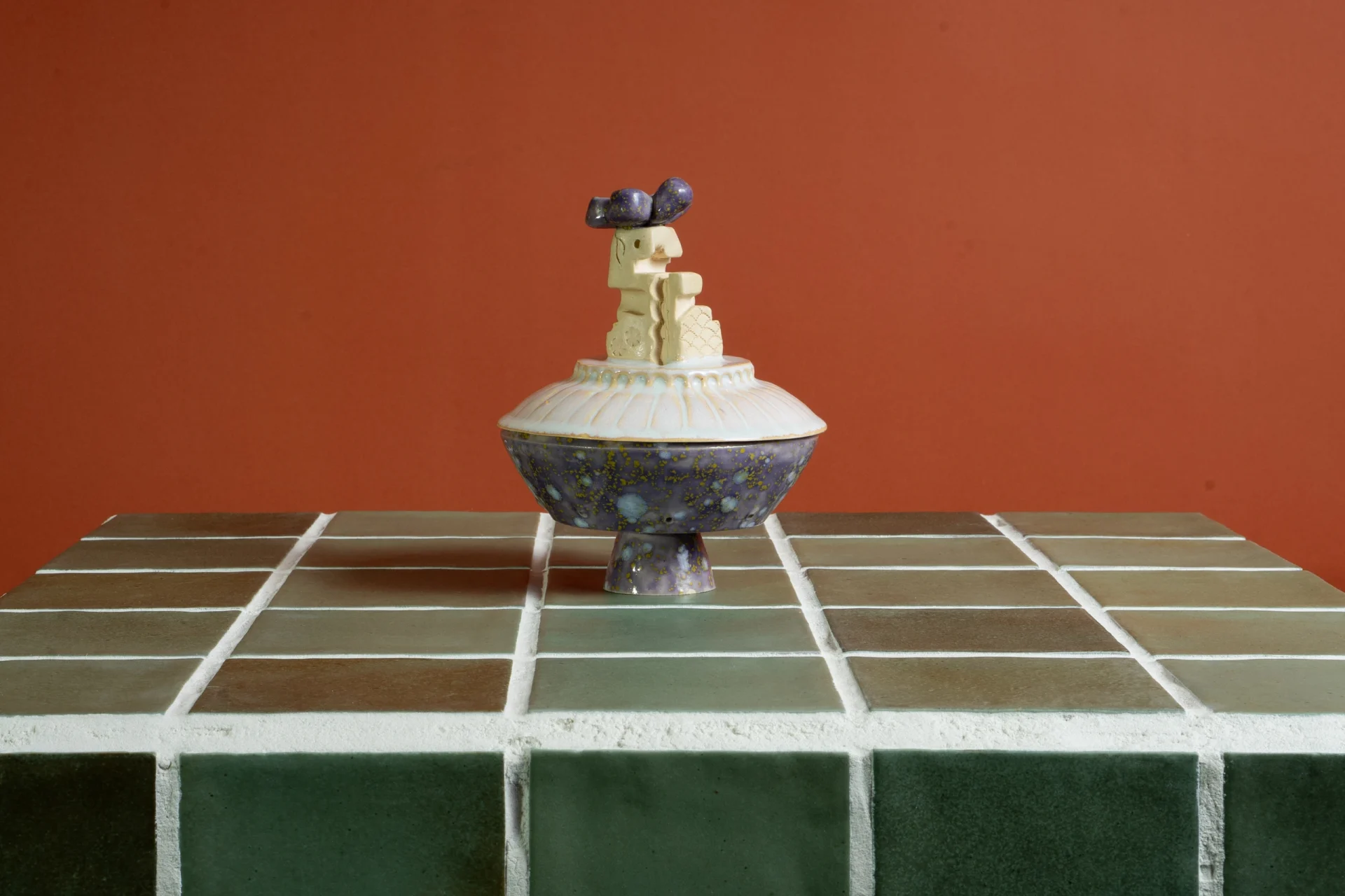 Flying Saucer Soap Dish on a green tiled counter