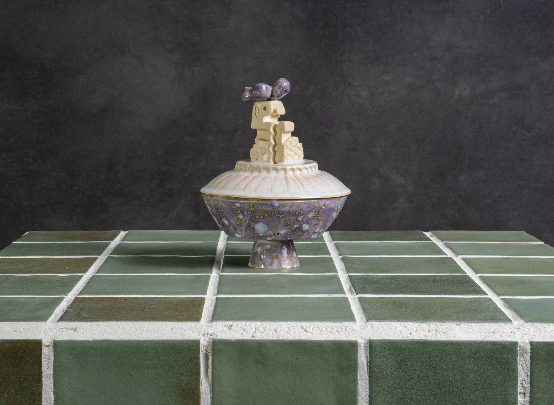 Flying Saucer Soap Dish, wide view on green tile