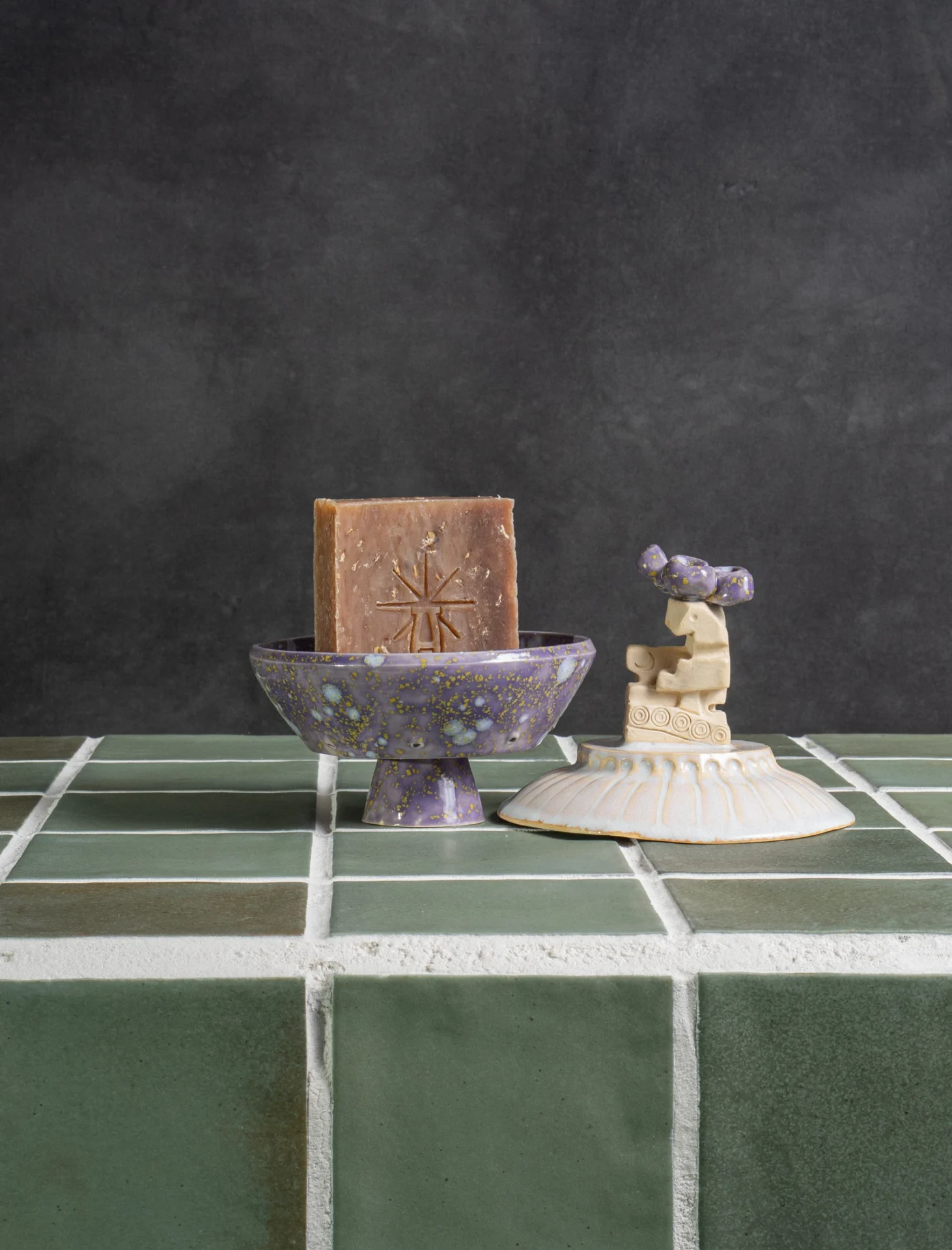 Soap bar standing in the Flying Saucer base, lid set aside